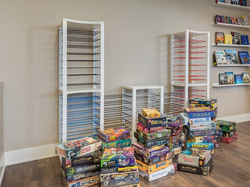 Modern game room with BoxThrone board game storage and display shelves