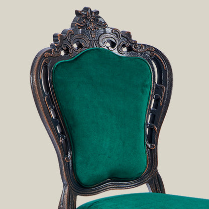 Green upholstered gaming chair with comfortable padded seat and backrest