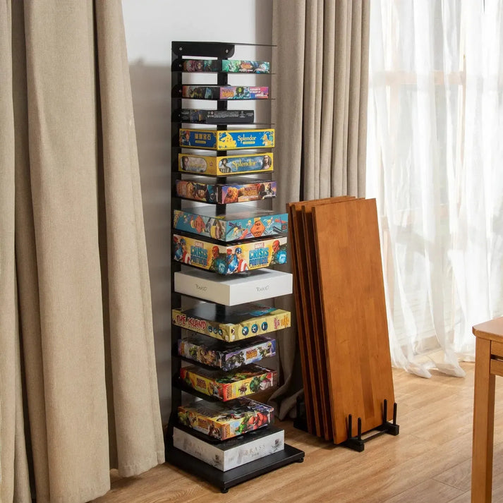 vertical shelves with board game boxes displayed in tiers