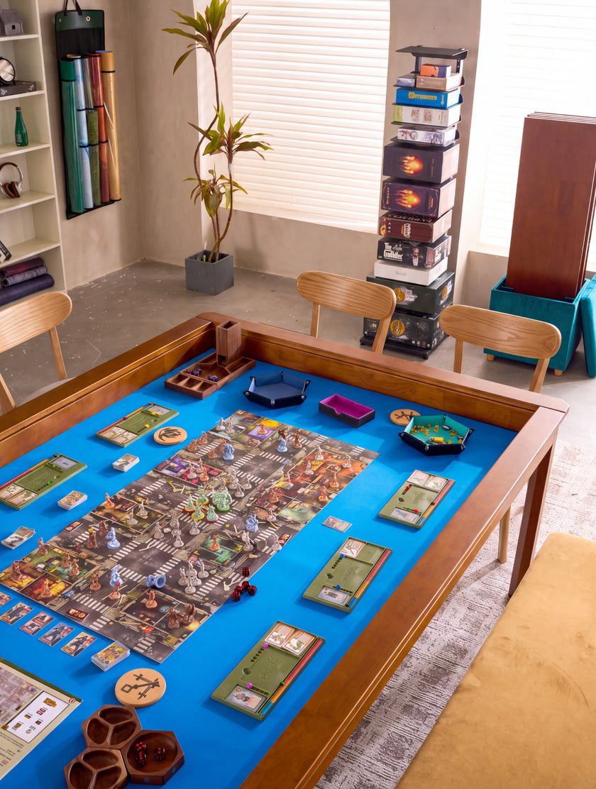 A large wooden-framed board game table with a bright blue felt playing surface