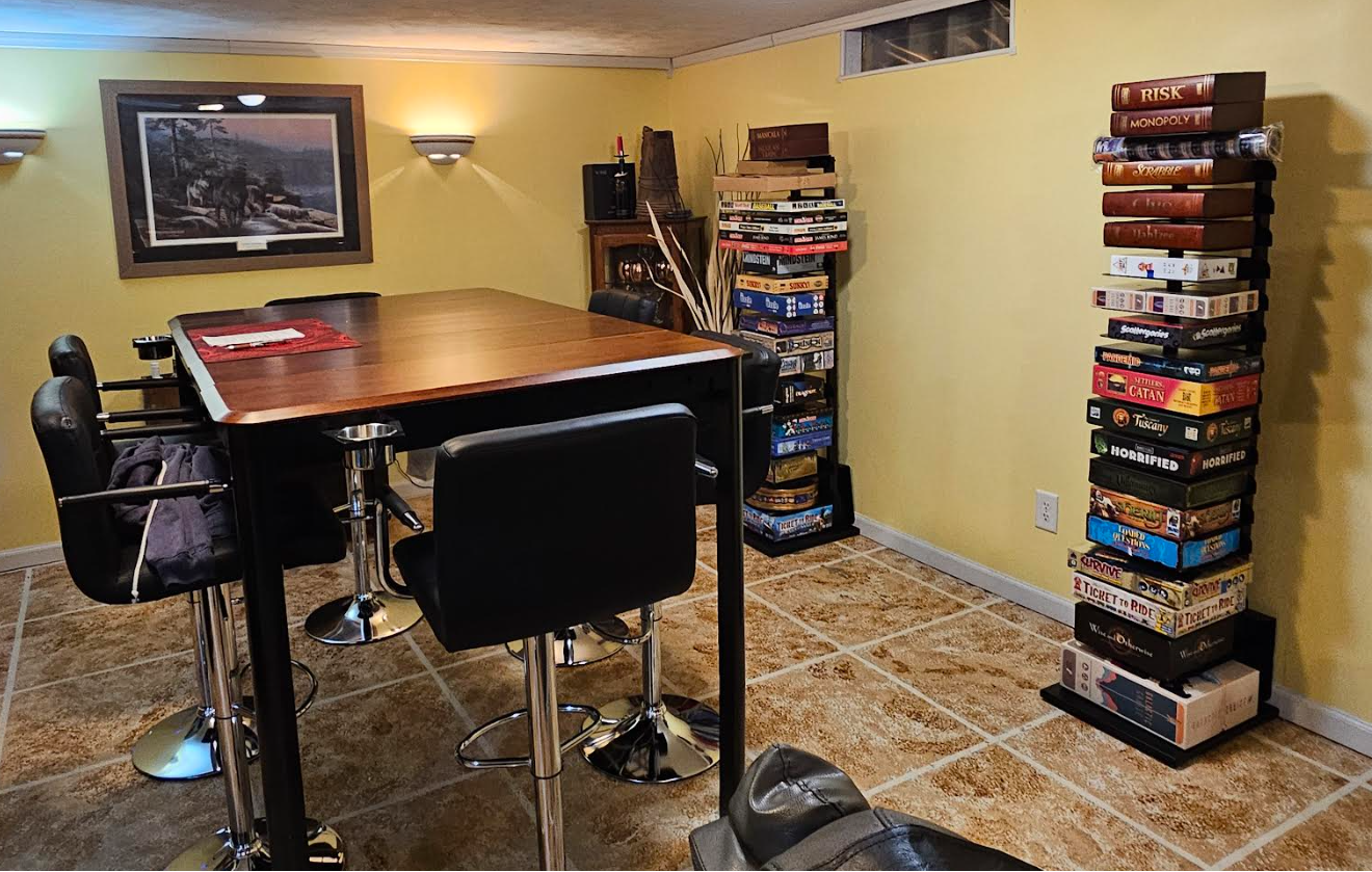 Tall board game storage shelf designed for corner spaces