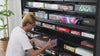 A modular board game storage shelf designed for modern tabletop collections