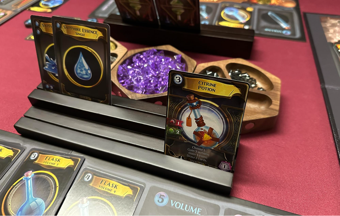 Card game with cards on a stand and on a table