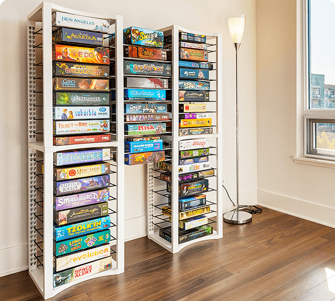 White board game shelves with horizontal rails storing boxed board games | BoxKing Gaming
